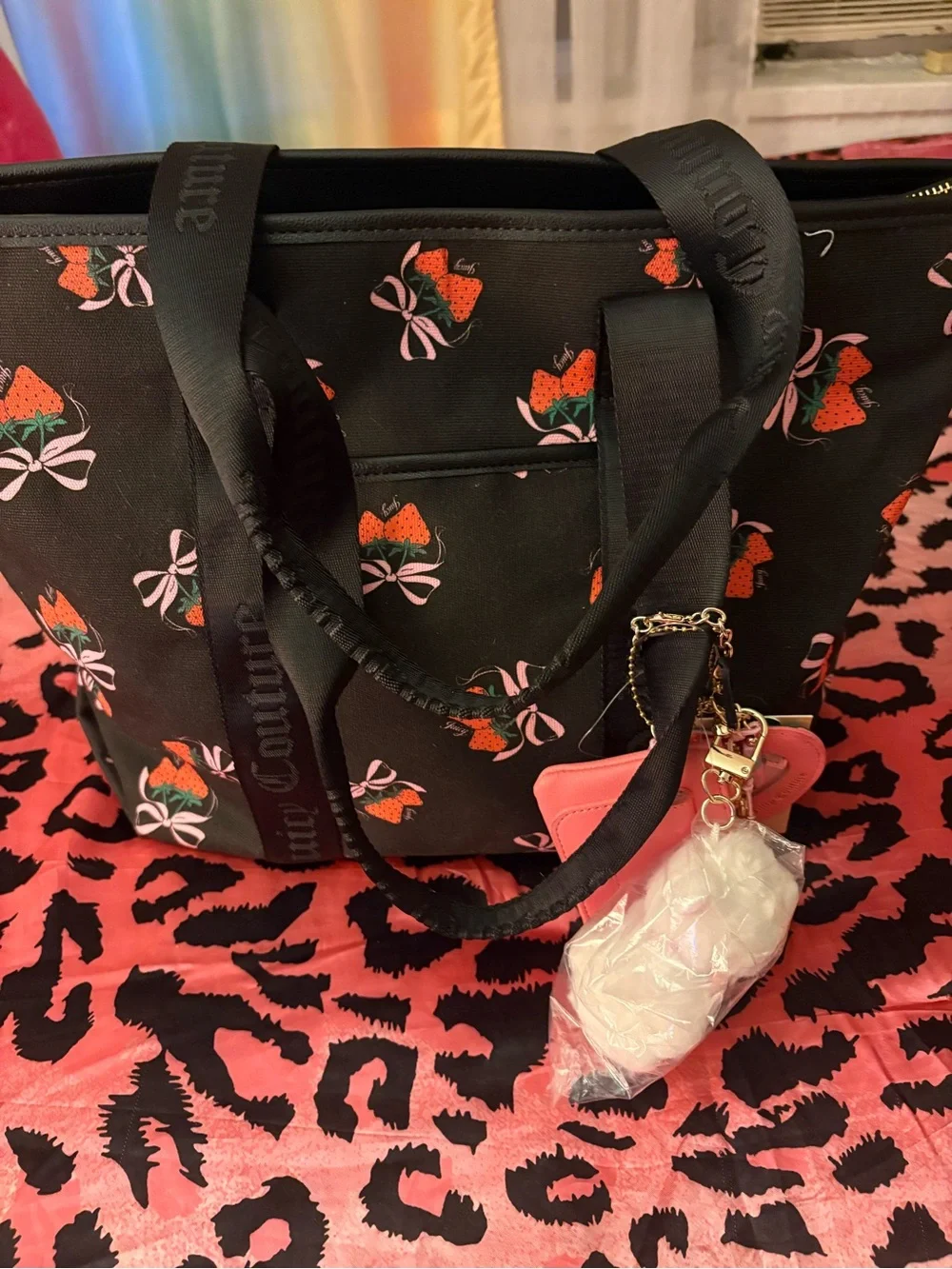 Black juicy couture tote bag with bag charms( super cute for back to school)